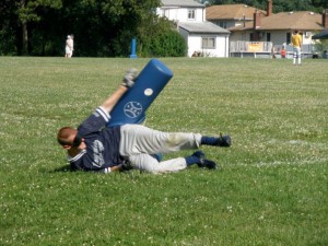 Photo of Joe McCormick sliding into base
