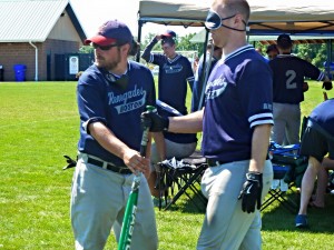 Tim Syphers working the on deck circle during our game against the Bayou City Heat as he helps Joe McCormick get his bat
