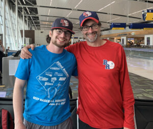Teigan and Rob pose in the airport