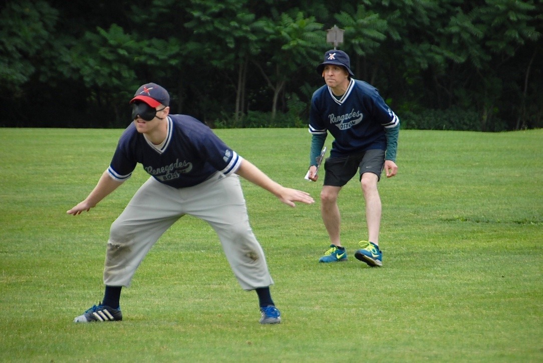 Bryan Grillo focused on the pitch as he is in the defense preparing to make a call with Joe Mccormick in front of him