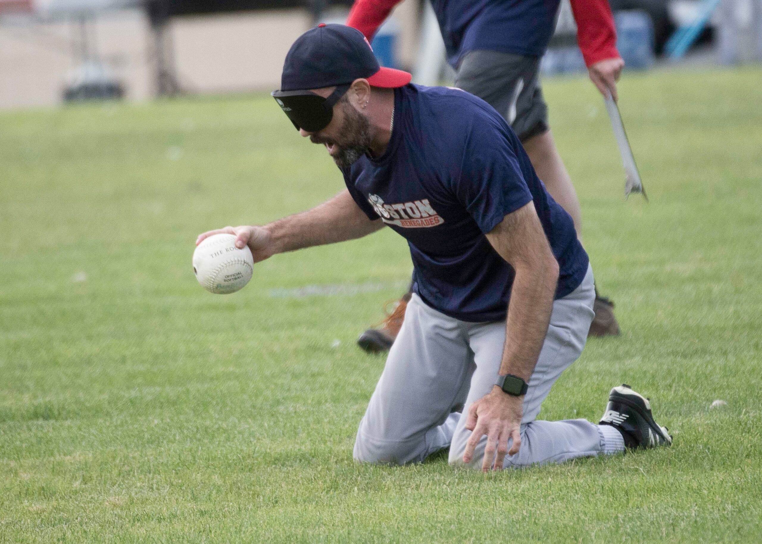 Rob Dias screams "up" as he makes a stop on defense with the ball clutched in his right hand