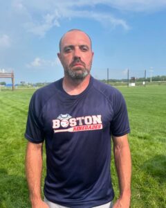 Ro Bdias stands alon without a smile on his face