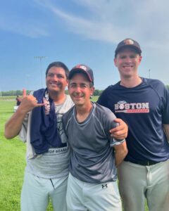 Shayne, Guy and Mac are all smiles as Guy and Shayne have taken off their game shirts. Shayne has his hands in a hang loose sign