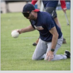 beepball player on field holding baseball